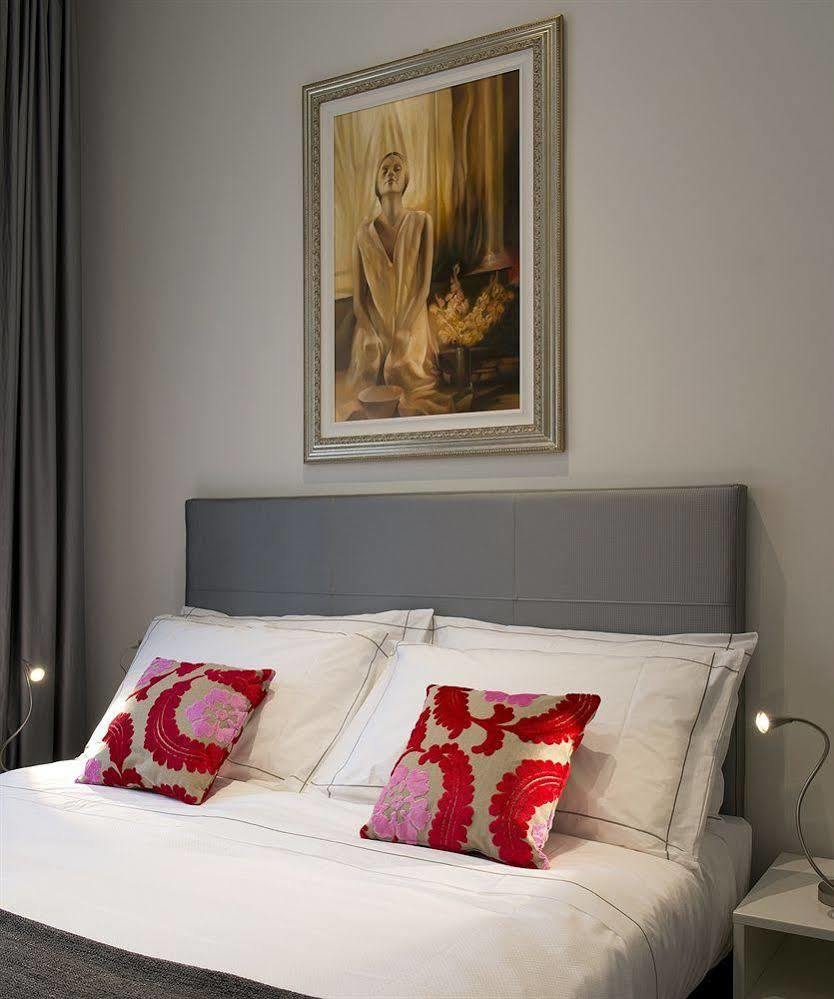 Monza City Rooms & Studios Bagian luar foto